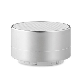 Hliníkový bluetooth reproduktor se světlem na spodní straně, matně stříbrný